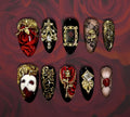 Hand-painted Phantom of the Opera inspired press-on nail set in crimson, black, and antique gold, featuring red roses, a white masquerade mask, musical notes, gilded baroque details, red theater curtains, jewels, and a wax-sealed love letter.