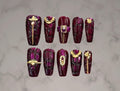 Luxury aubergine purple crocodile texture press-on nails with gold chains, buckles, clasps, and dimensional hardware