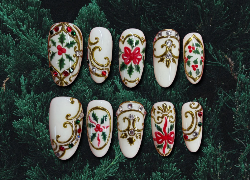 Luxury press-on nails featuring a holiday design inspired by porcelain Christmas ornaments 
