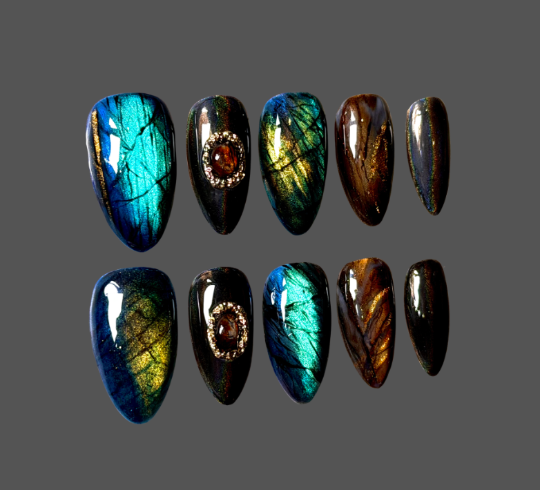 Luxury press-on nails of hyperrealistic crystal design including labradorite, smokey quartz, obsidian