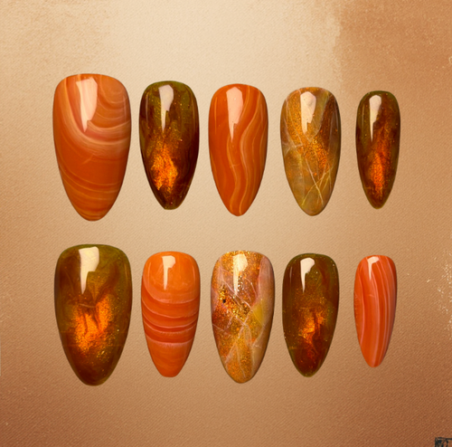 Luxury press-on nails of hyperrealistic crystal design Including amber, carnelian, and sunstone